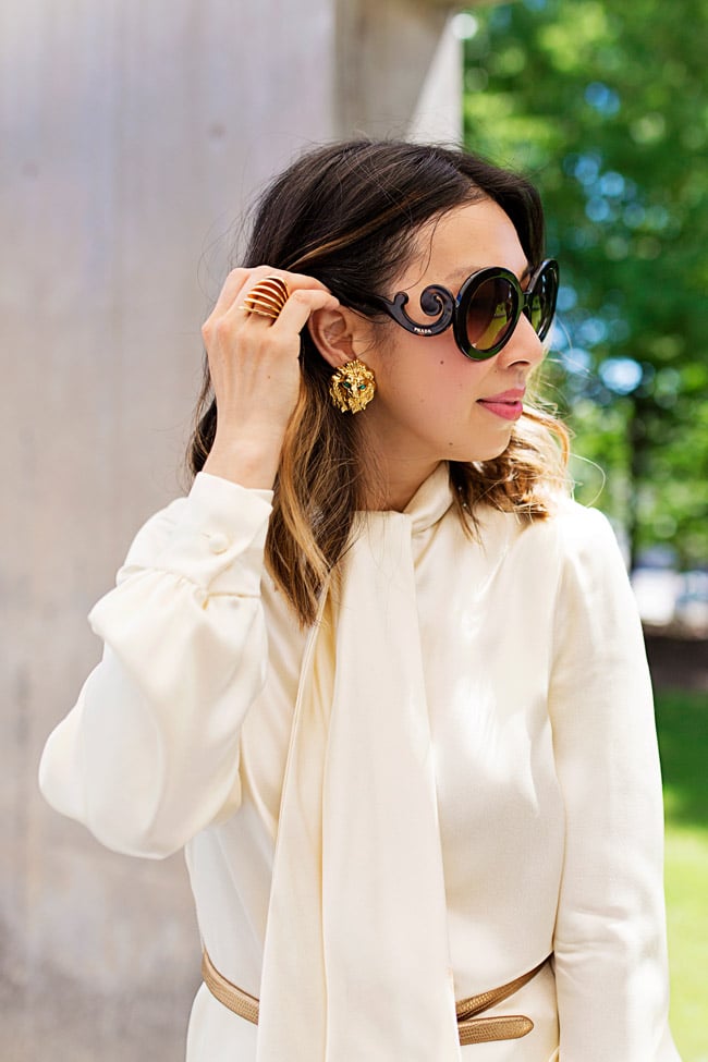 tie neck blouse, wide leg pant/trousers outfit, vintage jumpsuit, lion earrings, style of sam, from grandma with love, vita fede futuro ring, prada baroque sunglasses