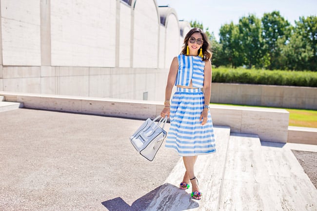 blue striped crop top and midi skirt matched set coordinates, yellow tassel earrings, sophia webster lilico floral heels, retro modern style, how to wear a midi skirt, white celine luggage tote
