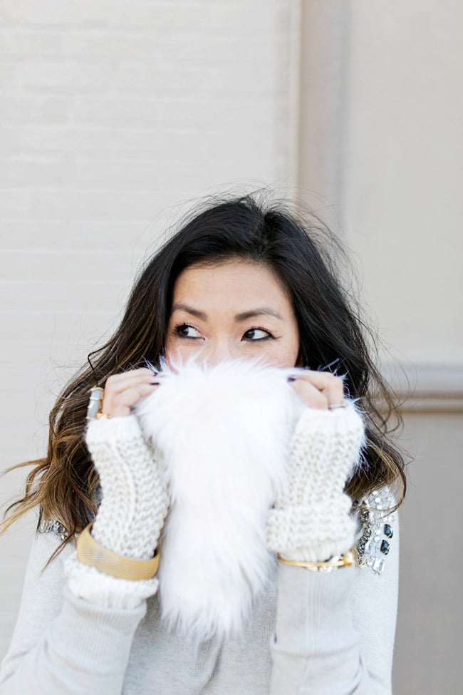 winter neutral outfit, how to wear a faux fur scarf, fingerless gloves