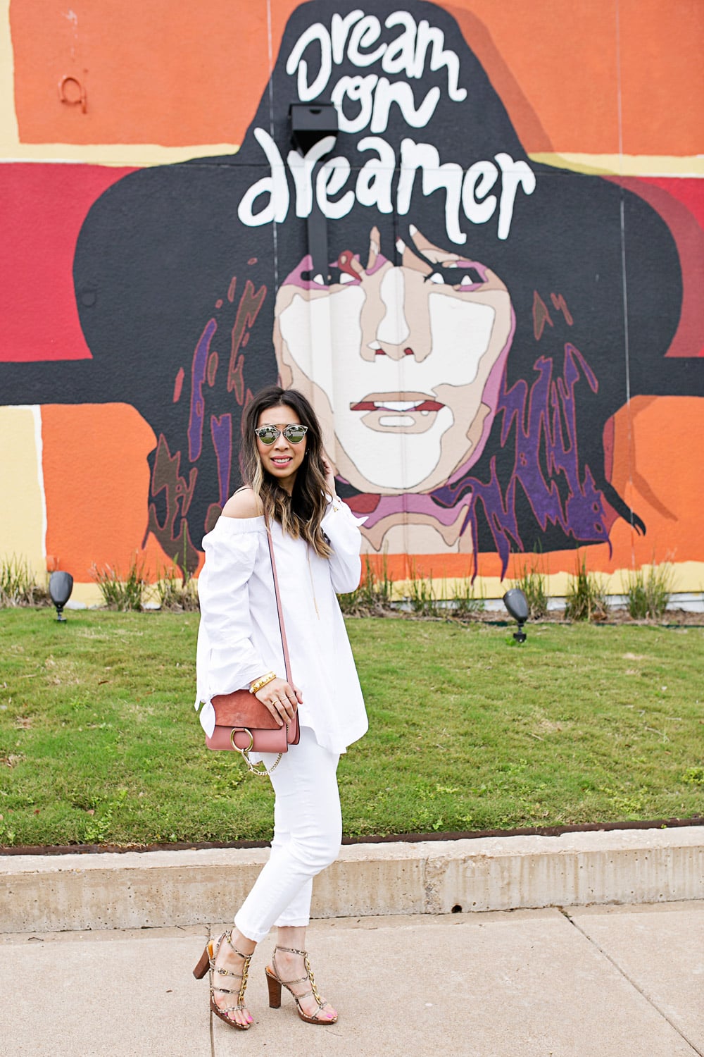 white off the shoulder top, dream on dreamer walls of fort worth, rose pink chloe faye bag, dior so real dupe sunglasses