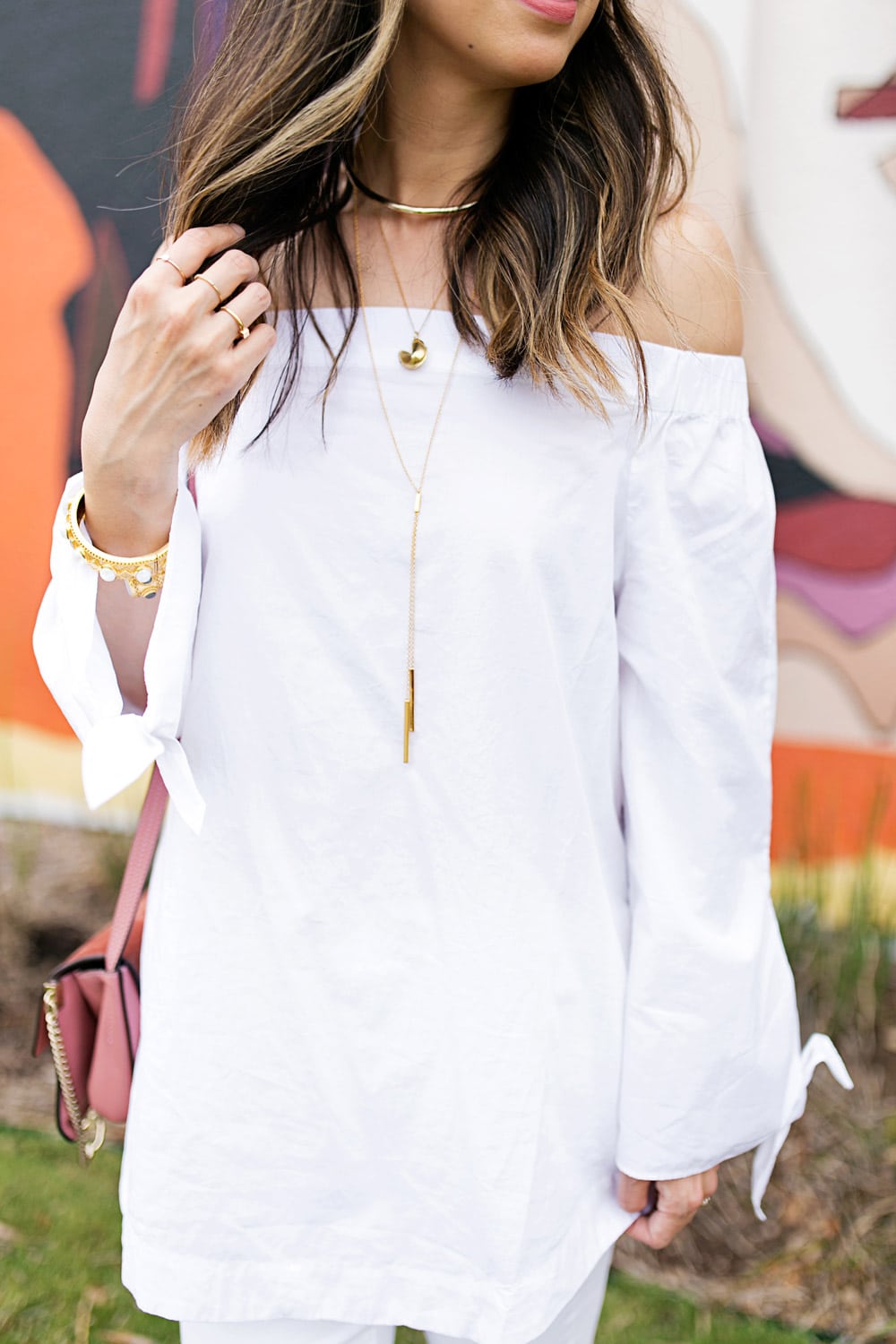 white off the shoulder top, rose pink chloe faye bag, alexis bittar thin collar necklace, fortune and frame fortune cookie necklace, gorjana mave lariat necklace