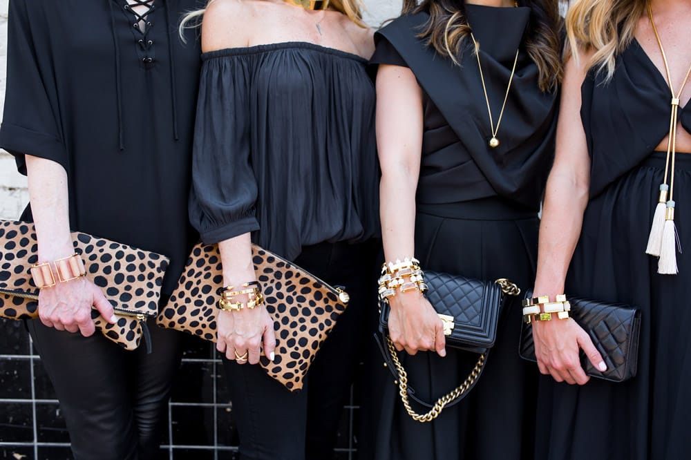 all black with gold accessories, lele sadoughi jewelry