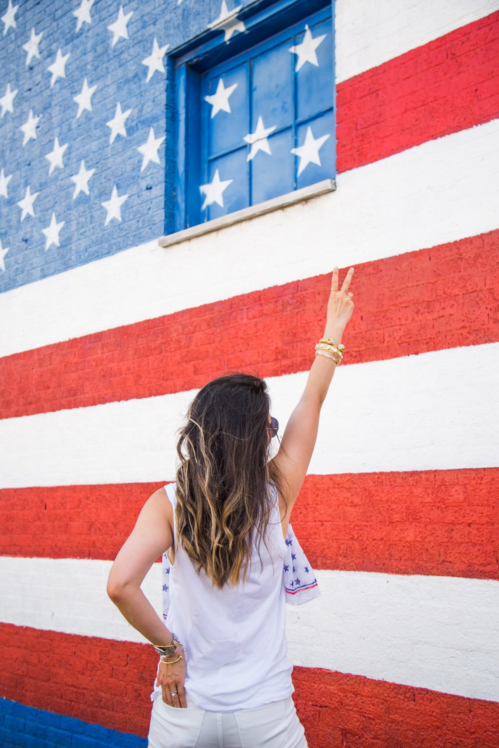 peace sign in front of american flag