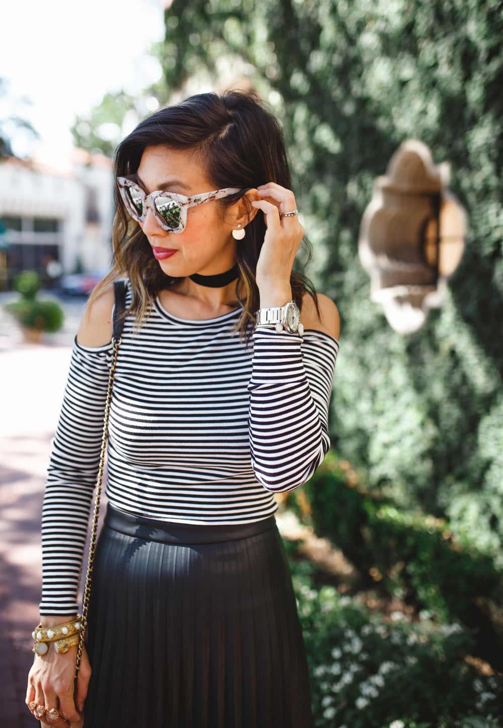 pleated leather midi skirt, striped cold shoulder top