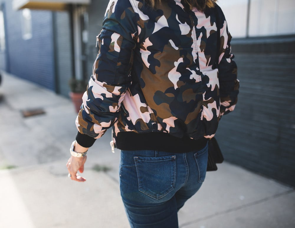 topshop camo bomber jacket and rear view of NYDJ uplift jeans