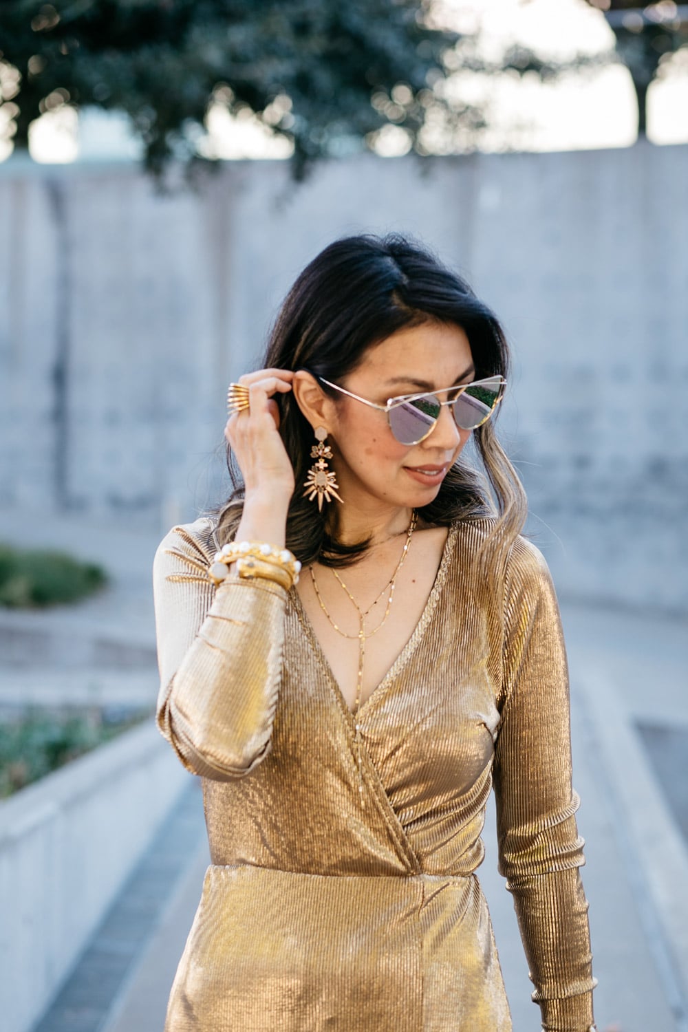 kendra scott isadora earrings, missguided gold pleated wrap dress