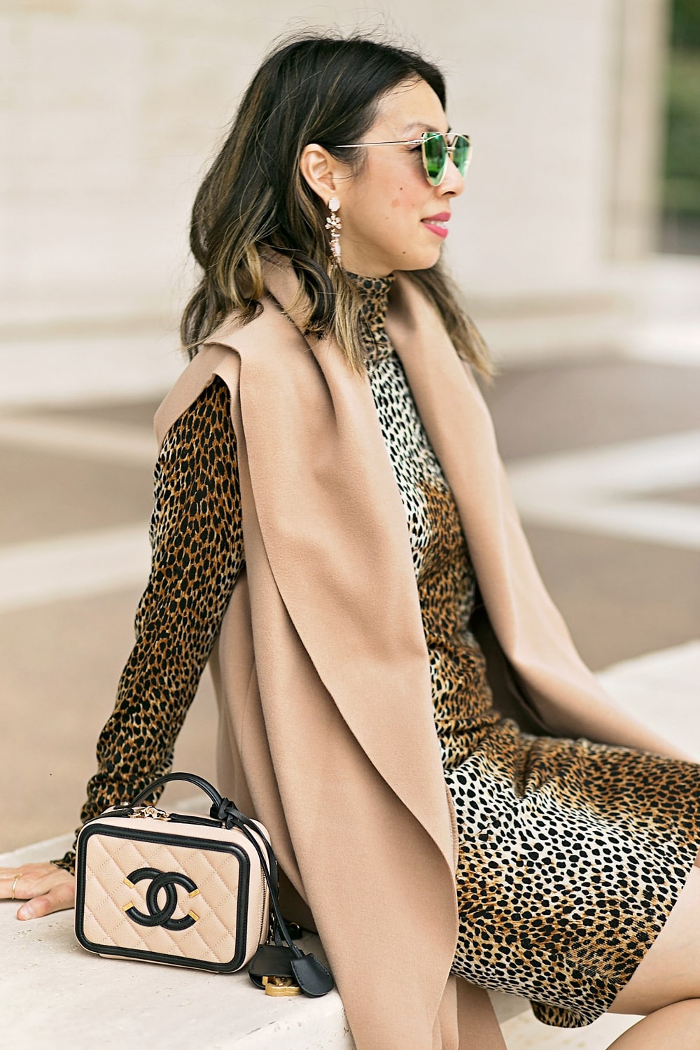 dolce and gabbana leopard print dress and camel vest, chanel filigree vanity bag
