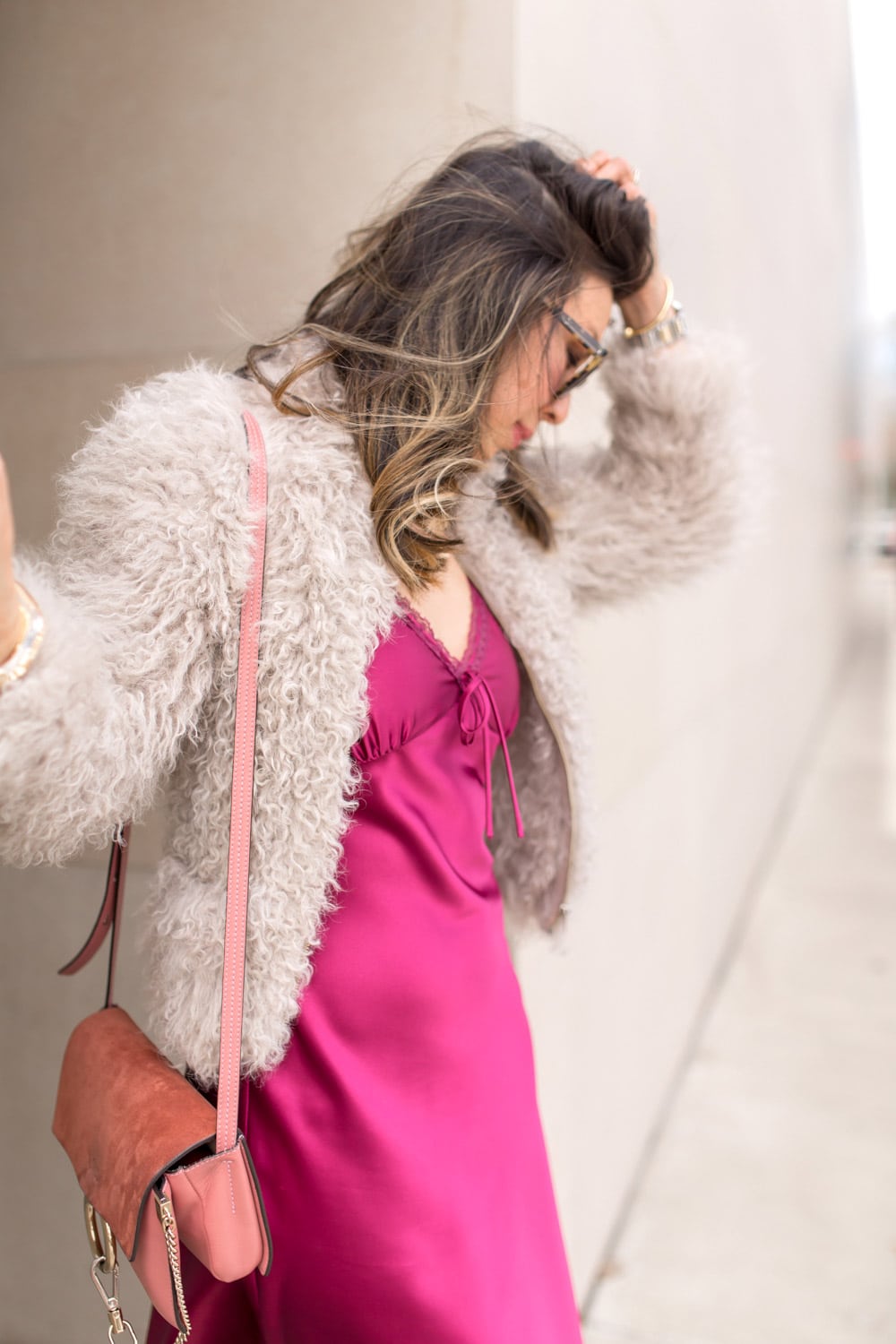 pink slip dress with iro kald fur jacket and rose chloe faye