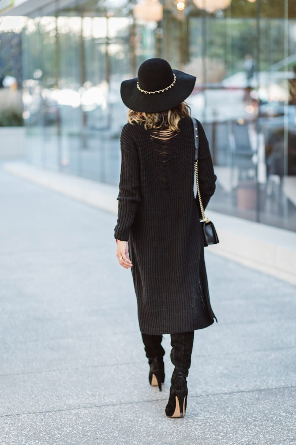 black high low sweater with sam edelman otk boots, wide brim hat