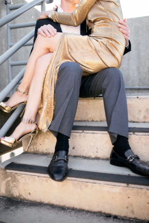 NYE gold dress, glamorous couple