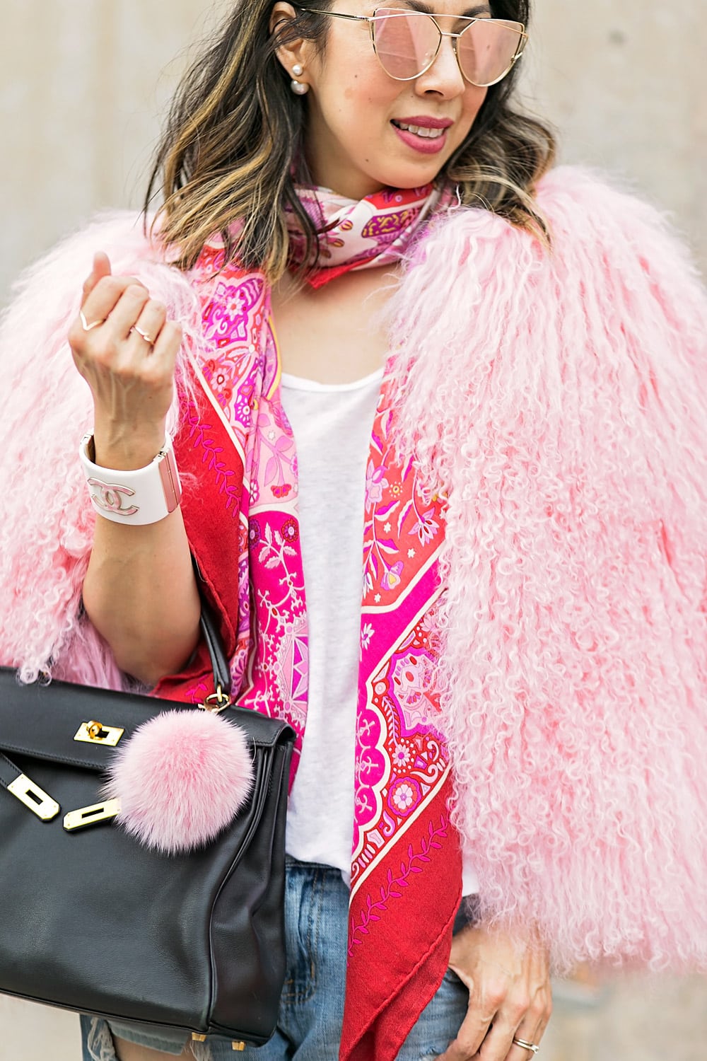 charlotte simone pink fur jacket with hermes shawl and black kelly bag