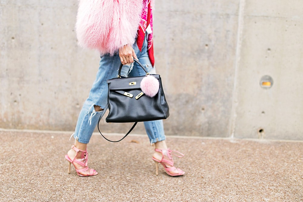 charlotte simone pink fur jacket with ripped boyfriend jeans, black hermes kelly and oscar de la renta pink oxford heels