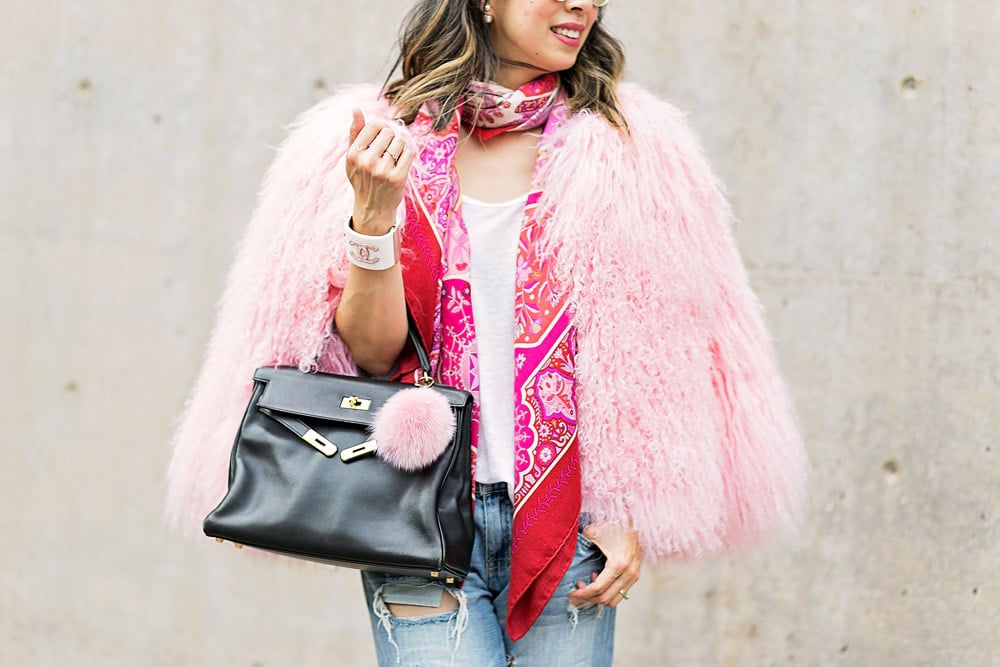 charlotte simone pink fur jacket with hermes shawl and black kelly bag