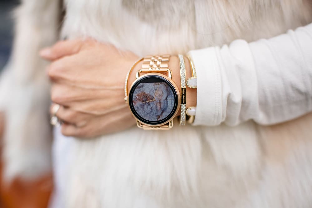winter white outfit with hat, fossil q wander rose gold watch and bracelets