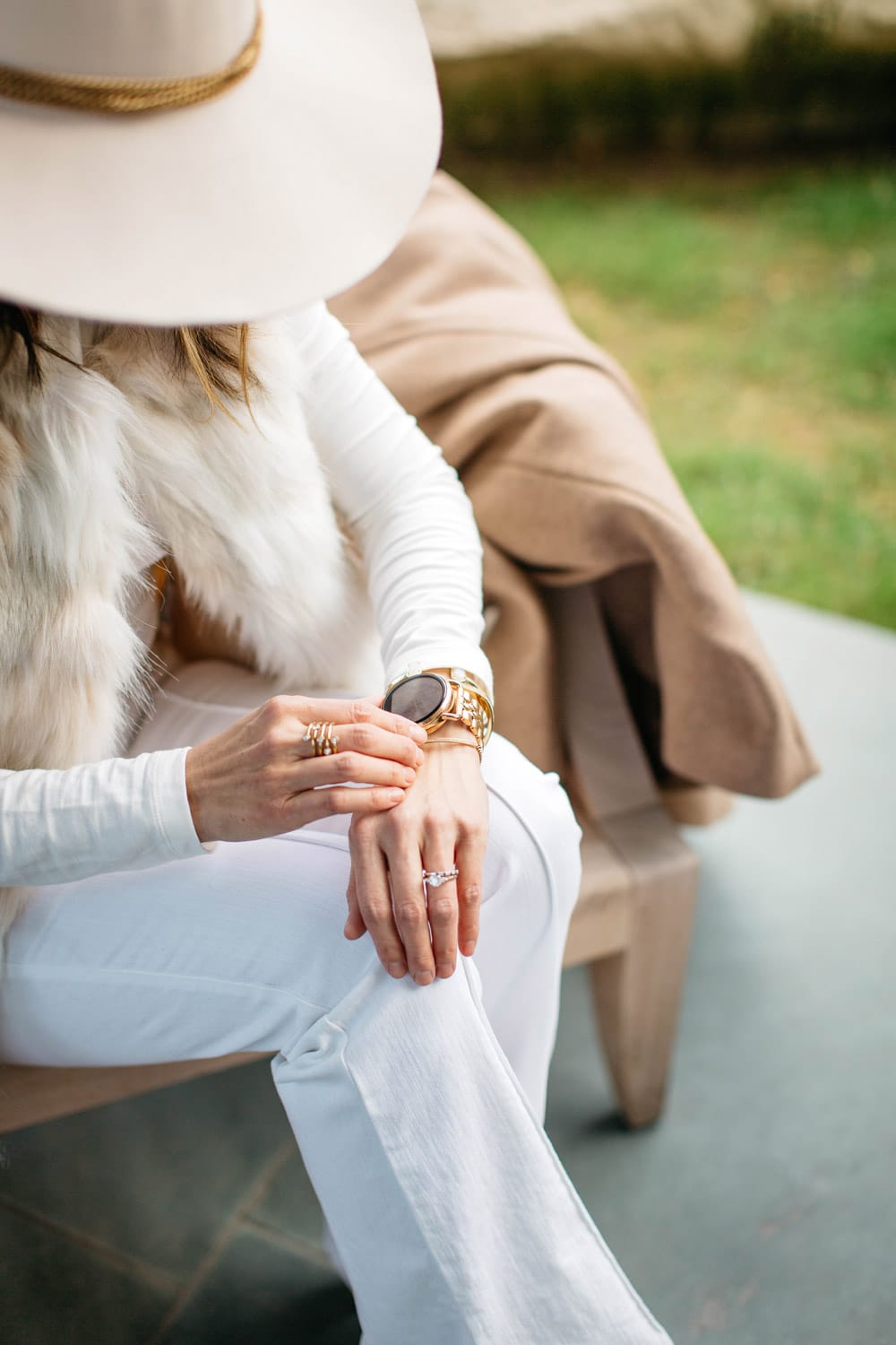 winter white outfit with hat, fossil q wander rose gold watch and bracelets