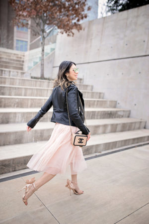 sophia webster chiara heel with pink tulle skirt, black moto jacket, chanel filigree vanity bag