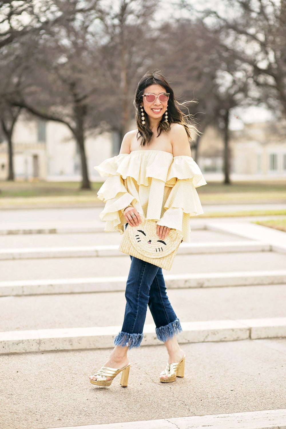beehive fort worth off the shoulder gingham ruffle top, frayed hem jeans, happy cat straw clutch, gold slides