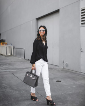 style of sam in black cutout top white jeans hermes birkin 30 etain