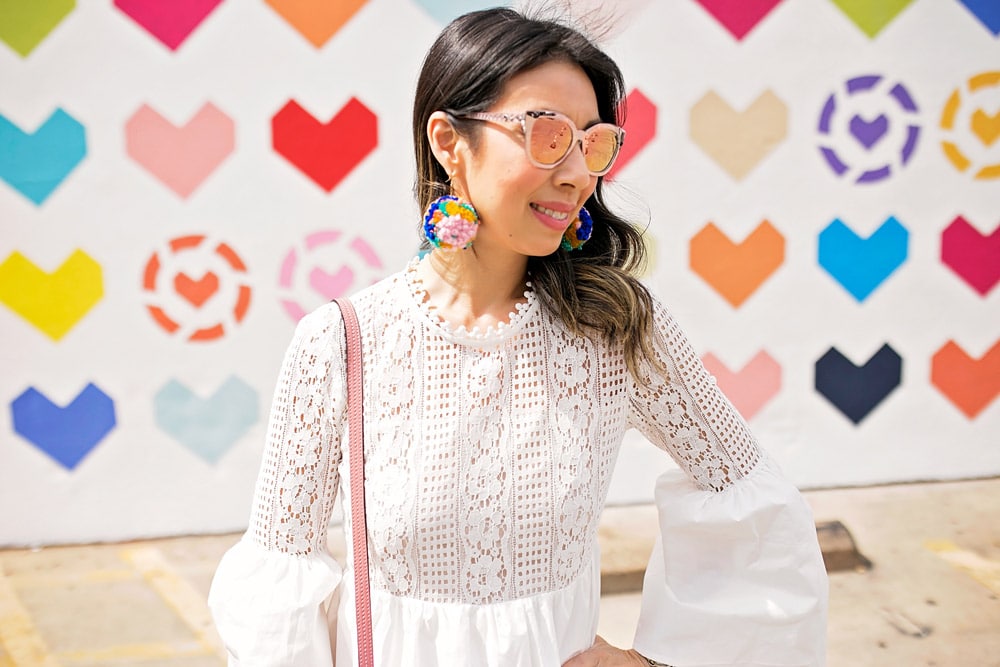 endless rose lace bell sleeve dress with pom pom earrings at liketoknow.it heart wall in dallas