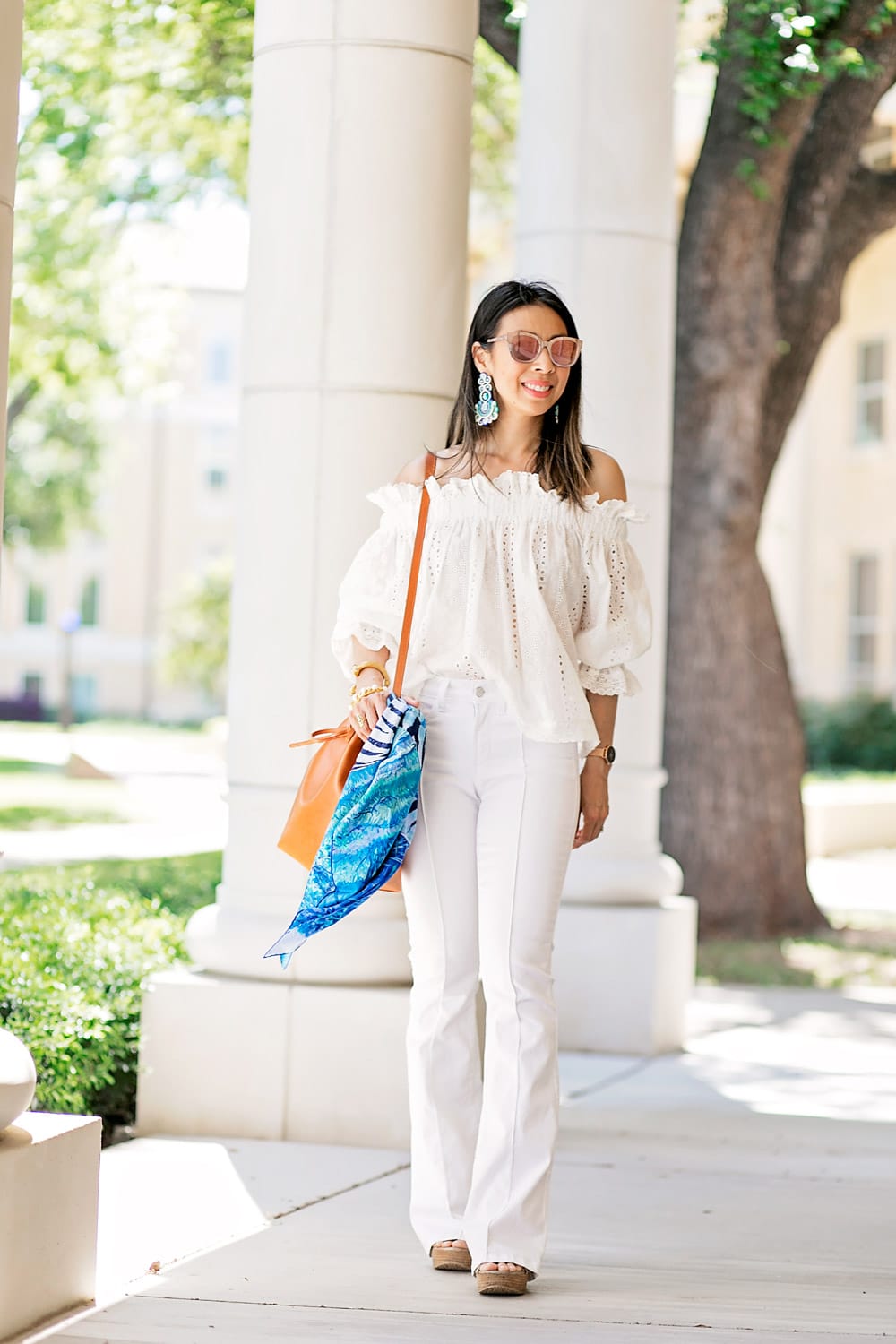endless rose eyelet off the shoulder top with Alejandra Aspillaga statement earrings and mansur gavriel bucket bag, spring all white outfit idea