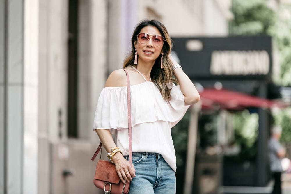 ruffle halter off the shoulder top with levi's 517 cropped flares and gucci silver marmont slides, rose pink chloe faye, bauble bar pinata tassel earrings, sonix rose pink aviator sunglasses