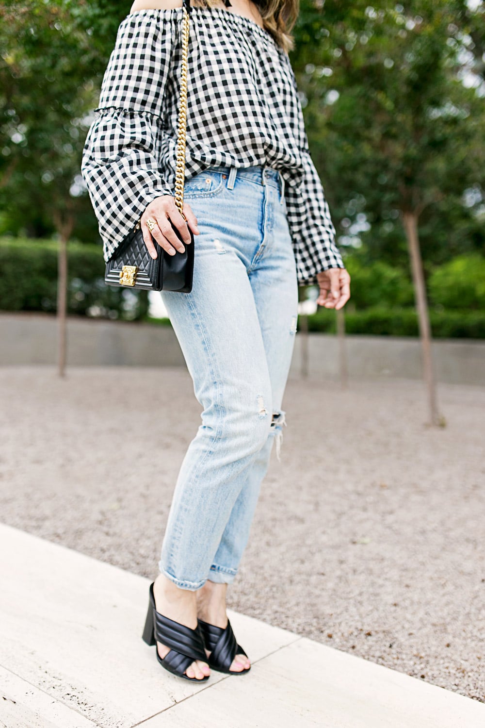 who what wear collection bardot sleeve gingham off the shoulder top with levi's light wash mom jeans, chanel boy bag and gucci webby mules 