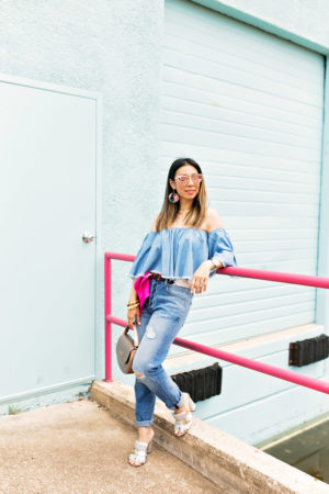 how to wear double denim off the shoulder frayed top DSTLD distressed mom jeans lipault pink gold saddle bag gucci silver kiltie heels