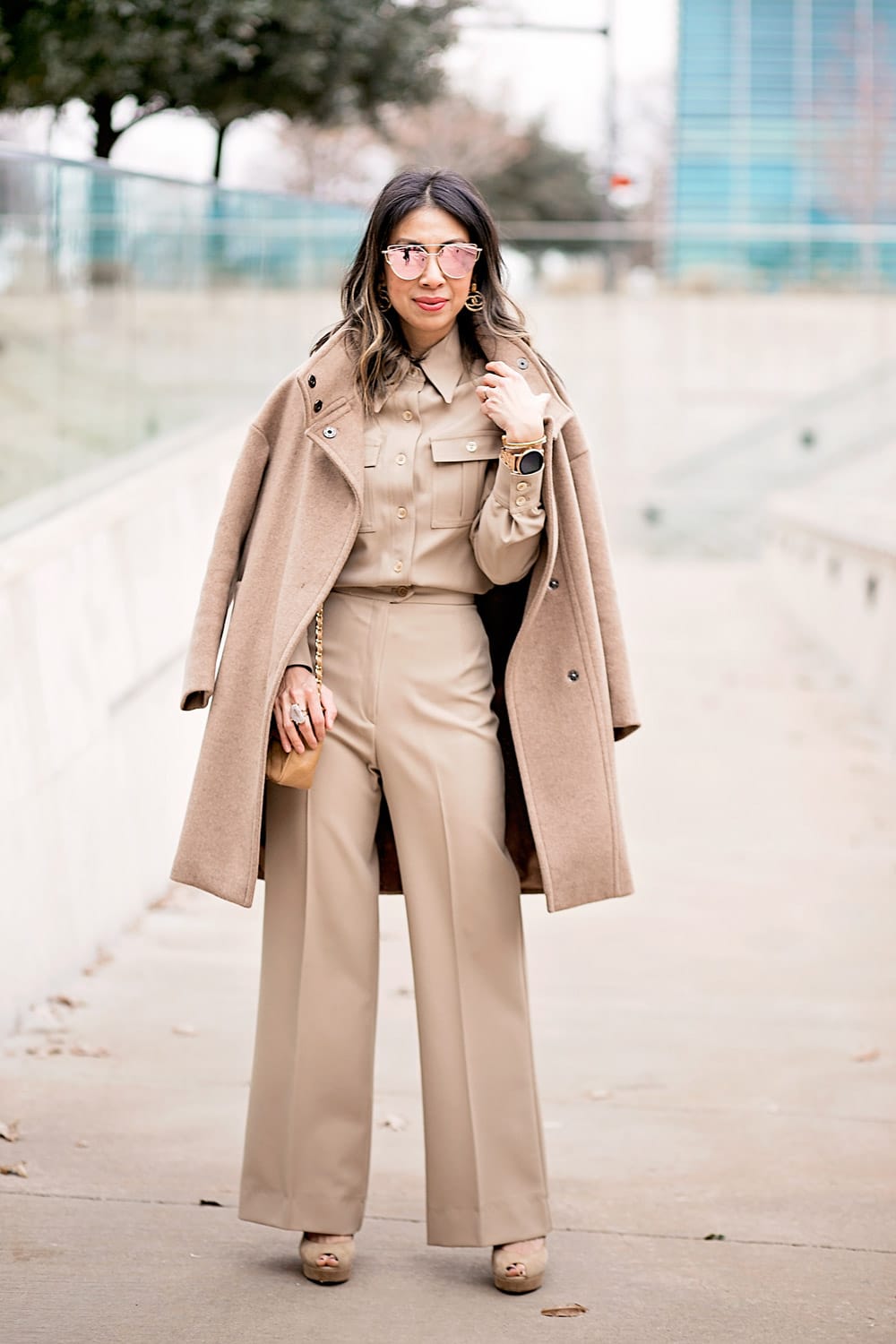 camel coat and beige coord set chanel earrings