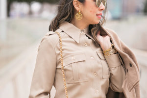 camel coat and beige coord set chanel earrings