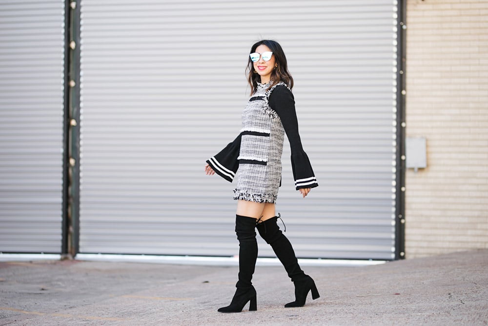 black and white bell sleeve sweater tweed dress over the knee boots