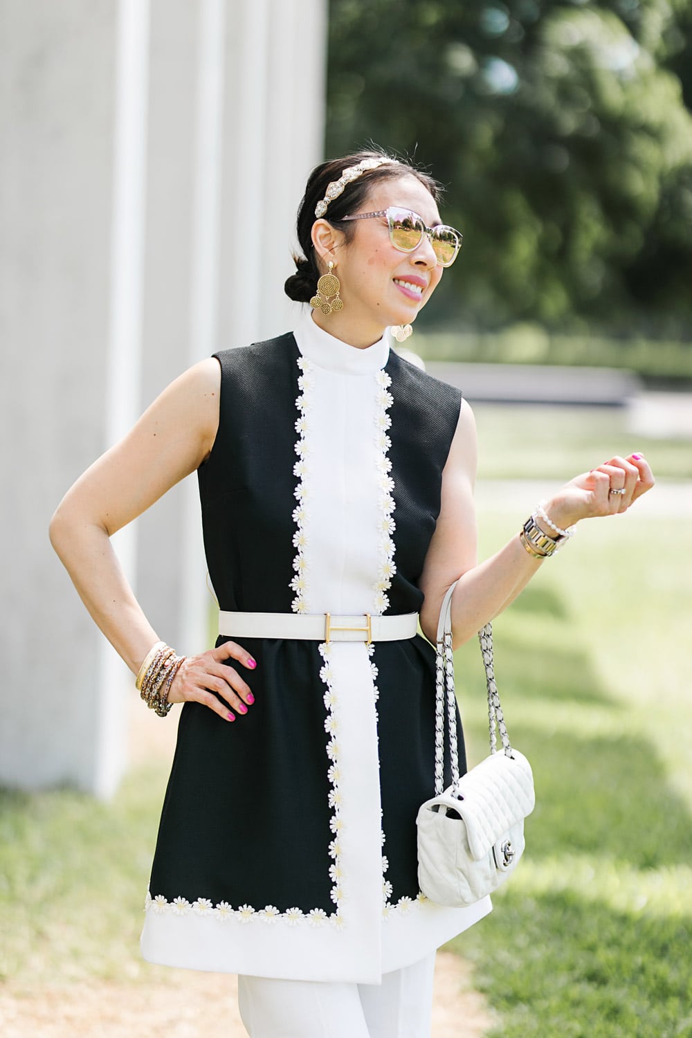 style of sam in vintage black and white daisy dress chanel flap