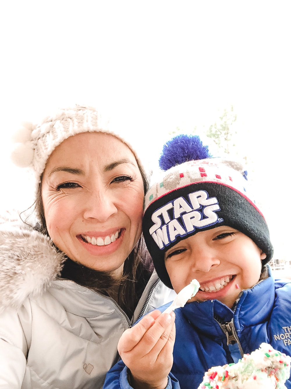 style of sam mothers day selfie with son in star wars hat
