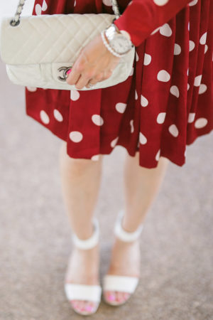 fort worth blogger in red polka dress and white chanel flap