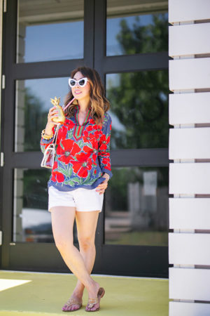 style of sam in red floral tunic white shorts pineapple tumbler