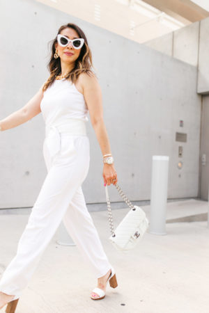style of sam in white jumpsuit chanel turnlock necklace earrings white flap