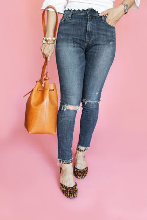 style of sam in able high rise lorena wash jeans mansur gavriel bucket bag cabi animal print shoes