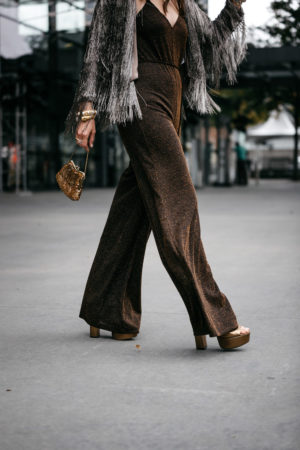 style of sam in rachel zoe fringe jacket reformation koda bronze metallic jumpsuit zoe by rachel zoe platform heels