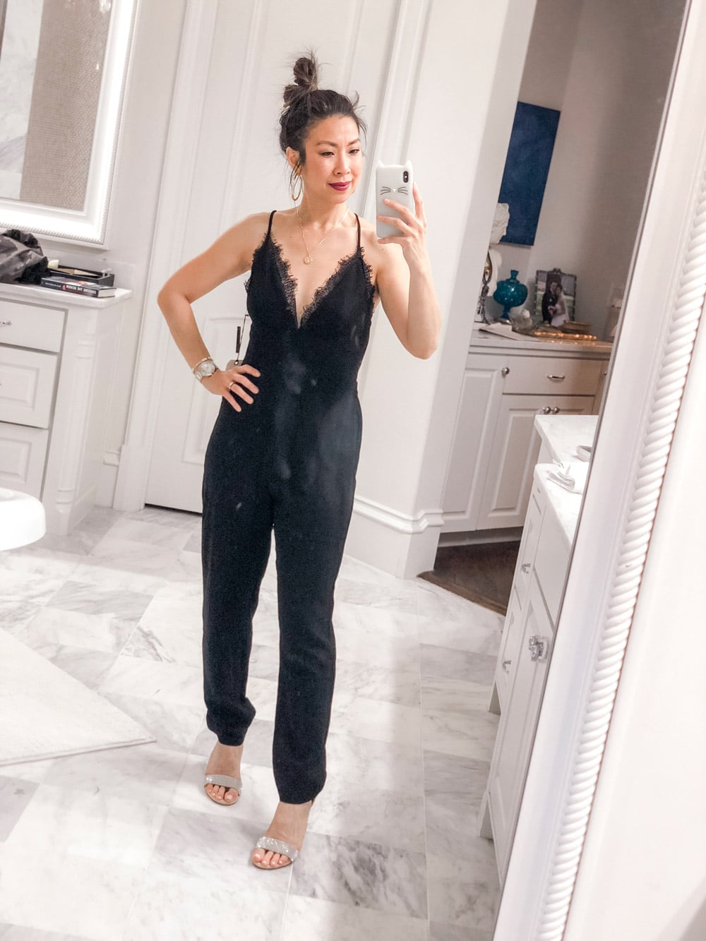 style of sam in leith deep v-neck lace jumpsuit bathroom selfie