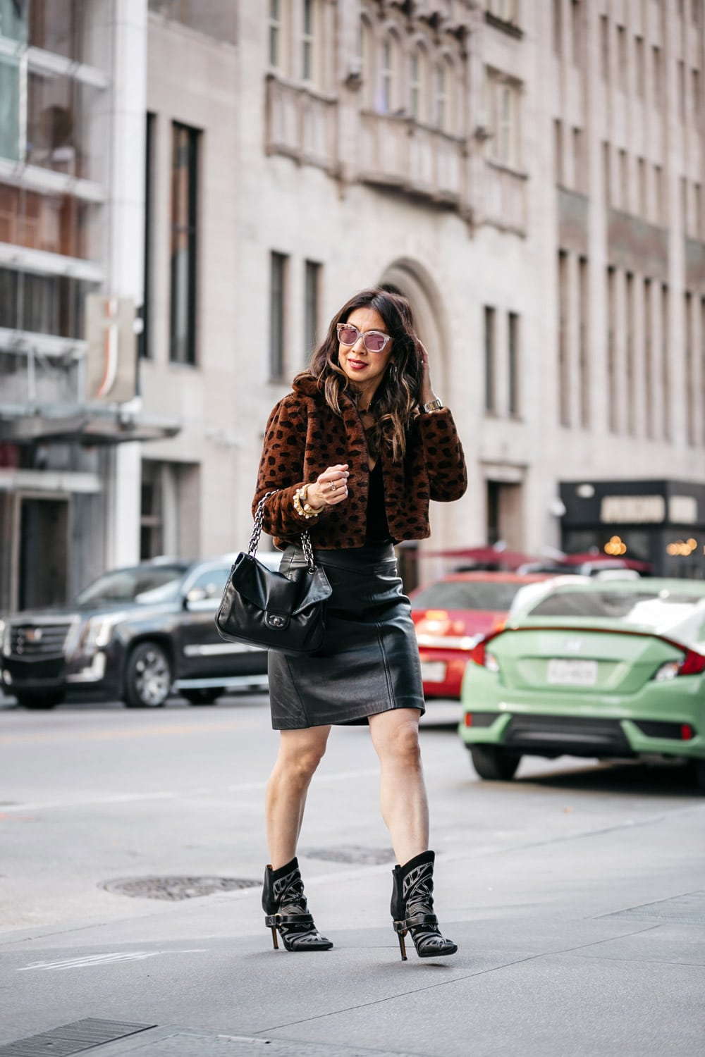 style of sam in leopard faux fur leopard teddy jacket leather skirt chanel soft and chain flap isabel marant blackson boot