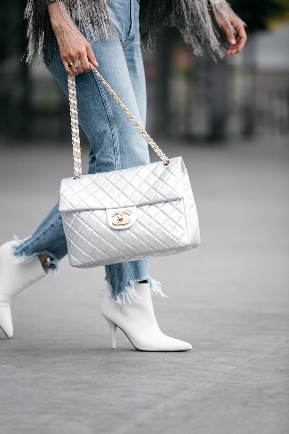 style of sam in vintage chanel silver maxi flap bag white booties 3x1 shelter crop jeans