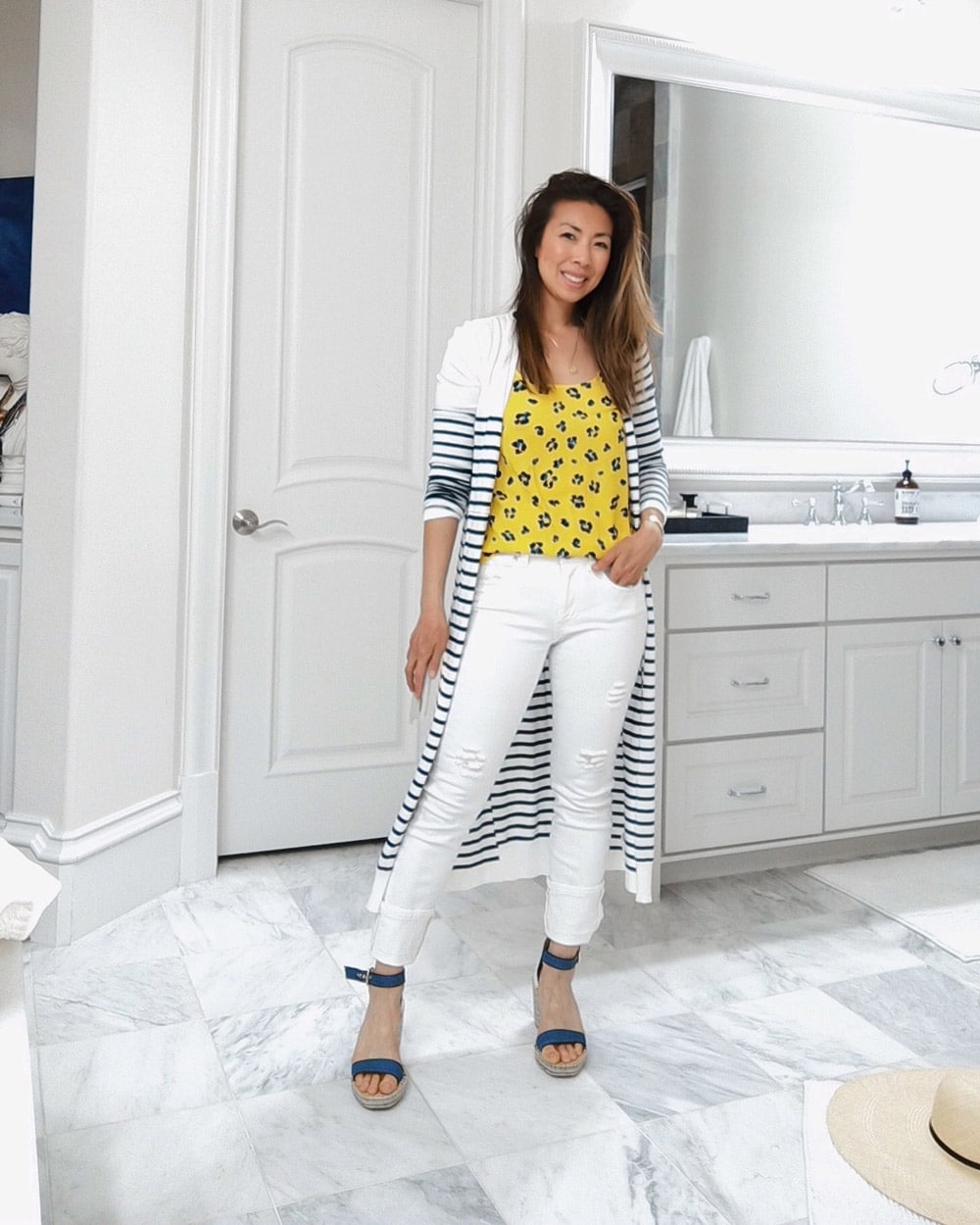 style of sam in cabi yellow sunny set, white high straight jeans, long striped cardigan, parker wedges