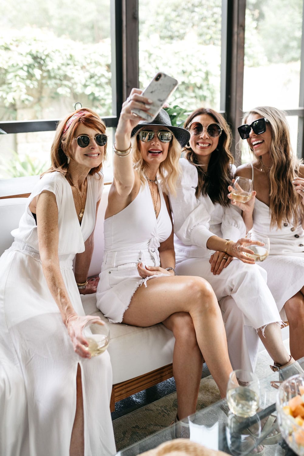 chic at every age gals in white pool party outfits taking selfie with rachel zoe summer box of style 2019