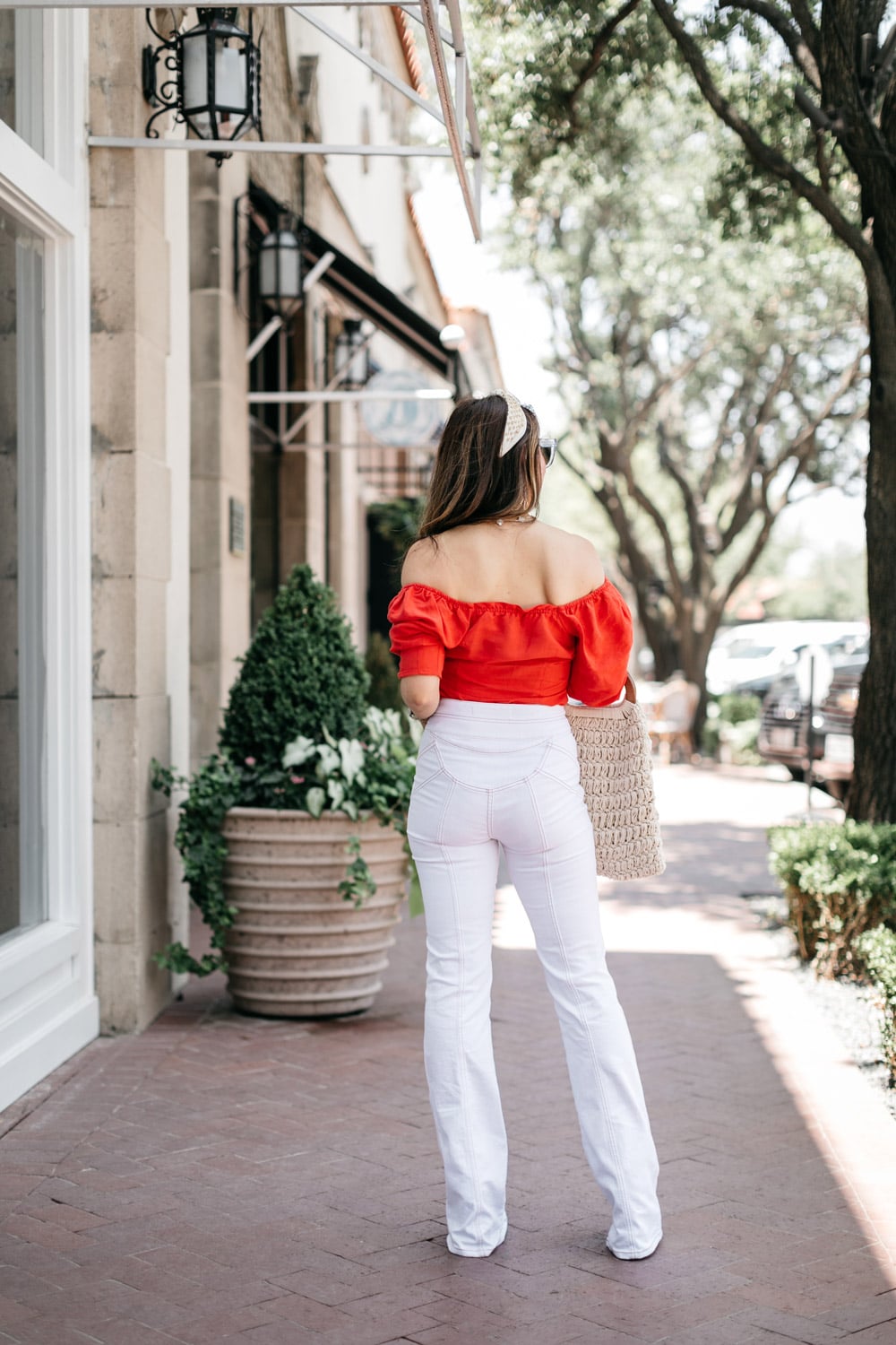 style of sam in what to wear for fourth of july, red puff sleeve top and veronica beard white farrah jeans