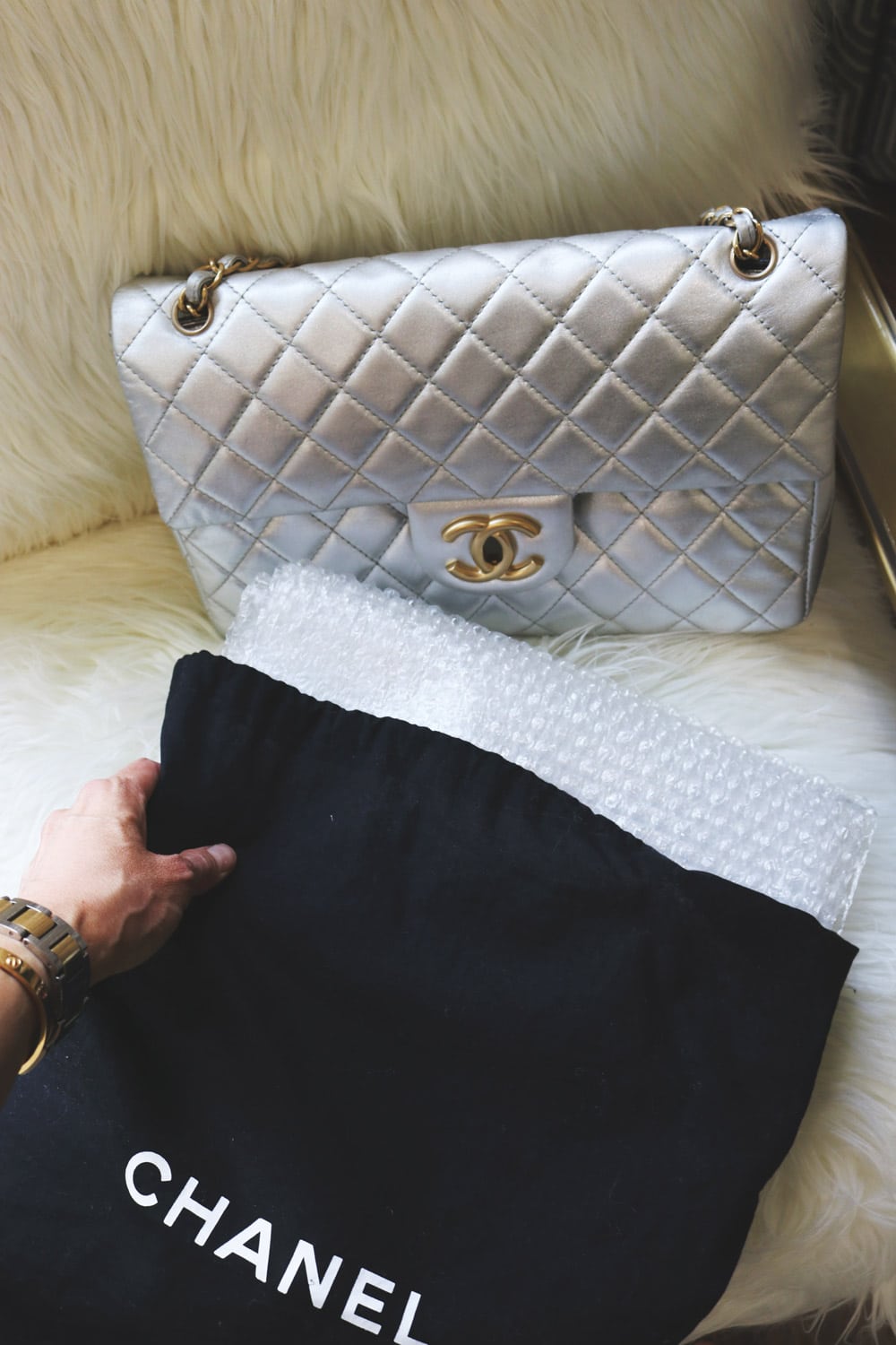 how to care for designer bags using bubble wrap and dust cover for chanel maxi bag