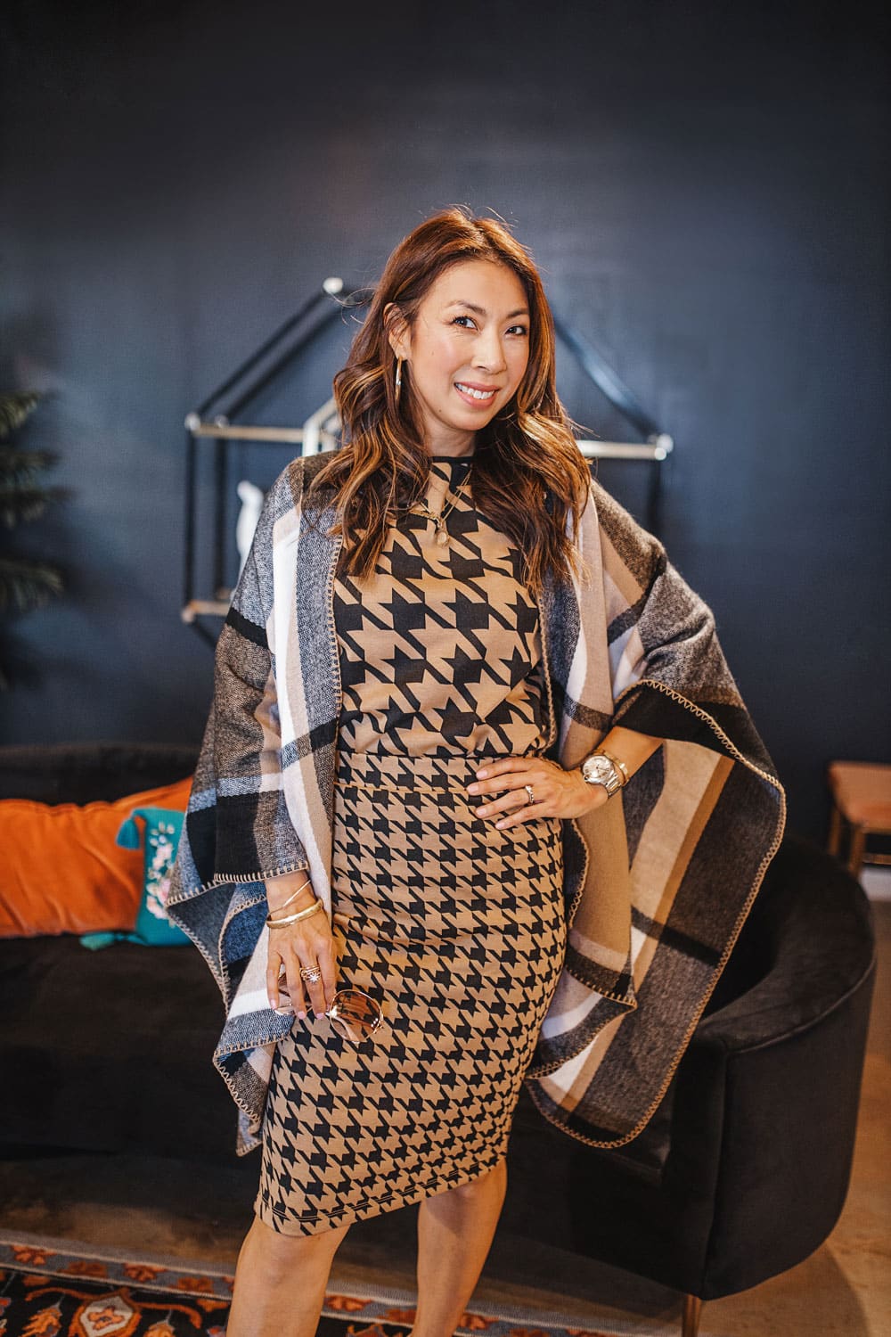 style of sam in houndstooth skirt set and plaid wrap cape