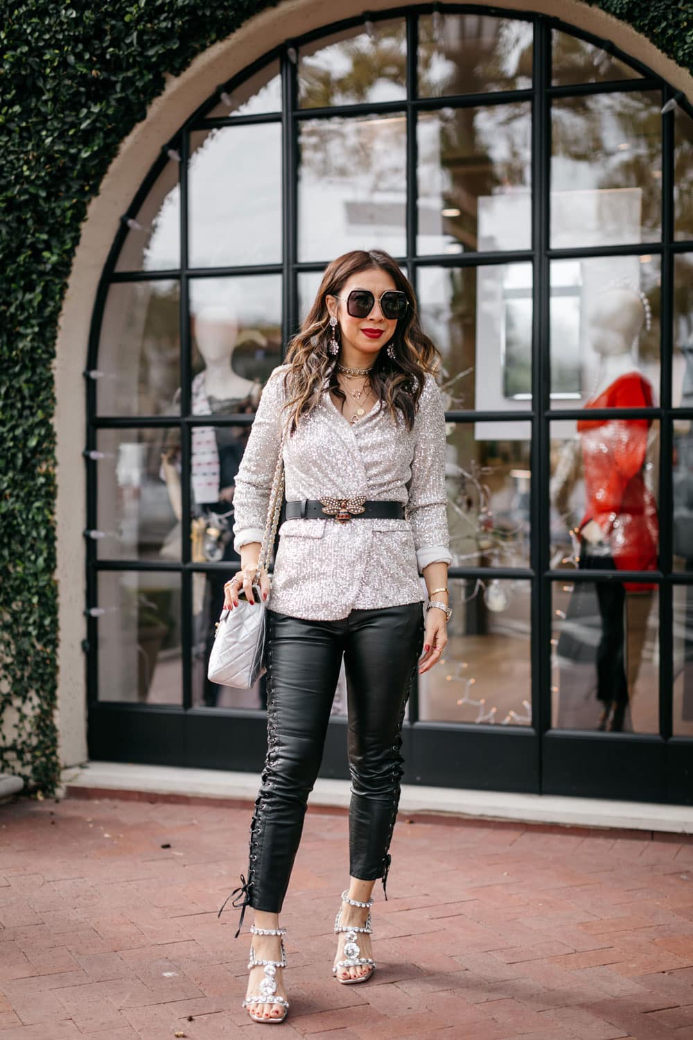 style of sam in sequin blazer, leather pants, gucci bee belt, amina muaddi look for less