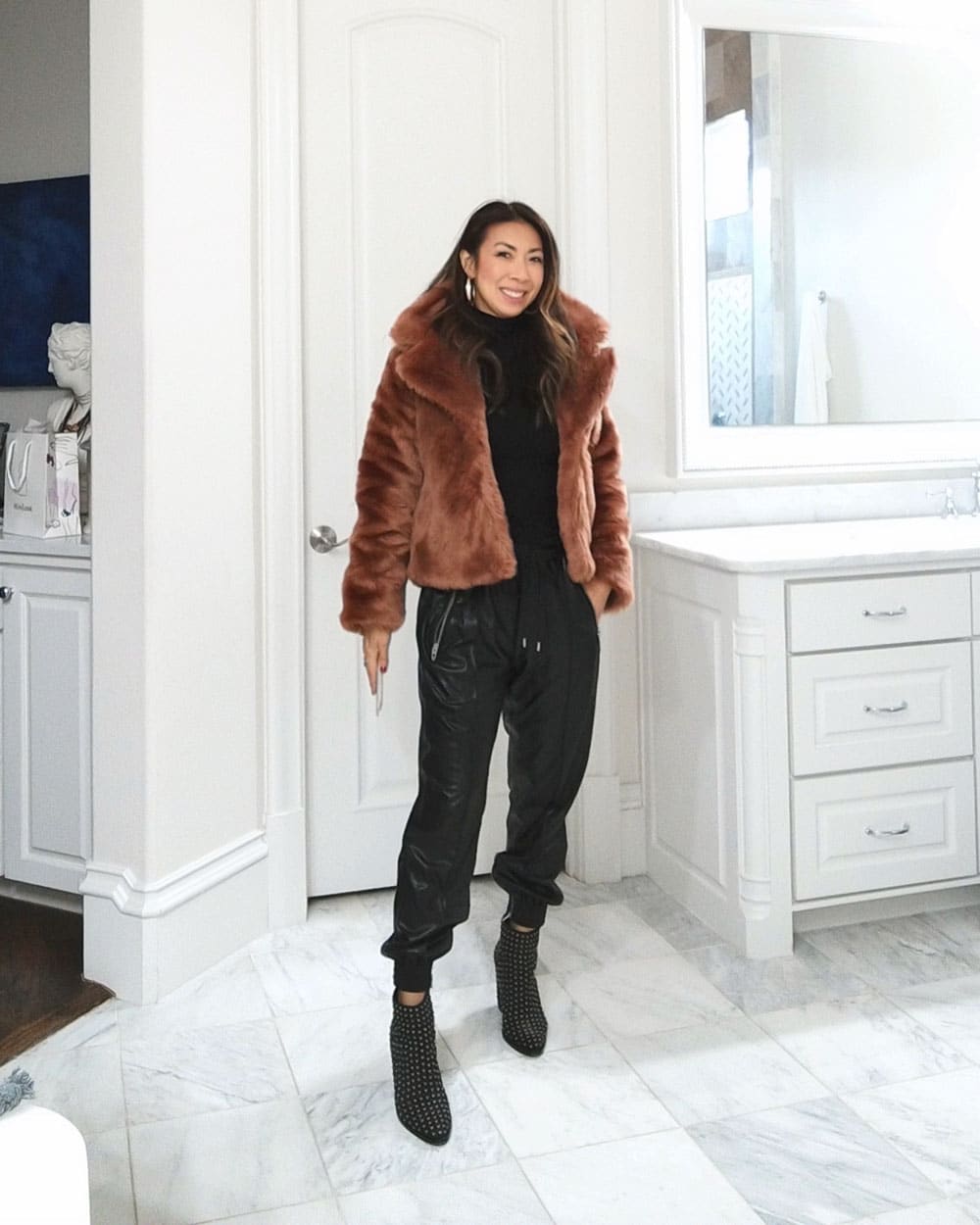 style of sam in faux fur jacket and faux leather joggers with booties, easy and chic mom outfit