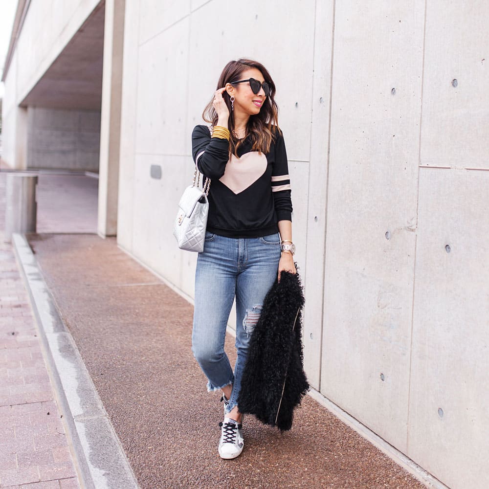 style of sam in heart sweatshirt, iro fur jacket, golden goose sneakers, casual valentine's day outfit