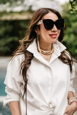 style of sam in noble 31 lolo white button down shirt, vintage snake chain necklace, cult gaia earrings
