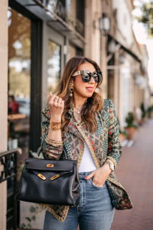 style of sam in vintage neiman marcus embellished jacket, hermes kelly bag and chanel earrings cuff, linda farrow dunaway sunglasses, vintage outfits